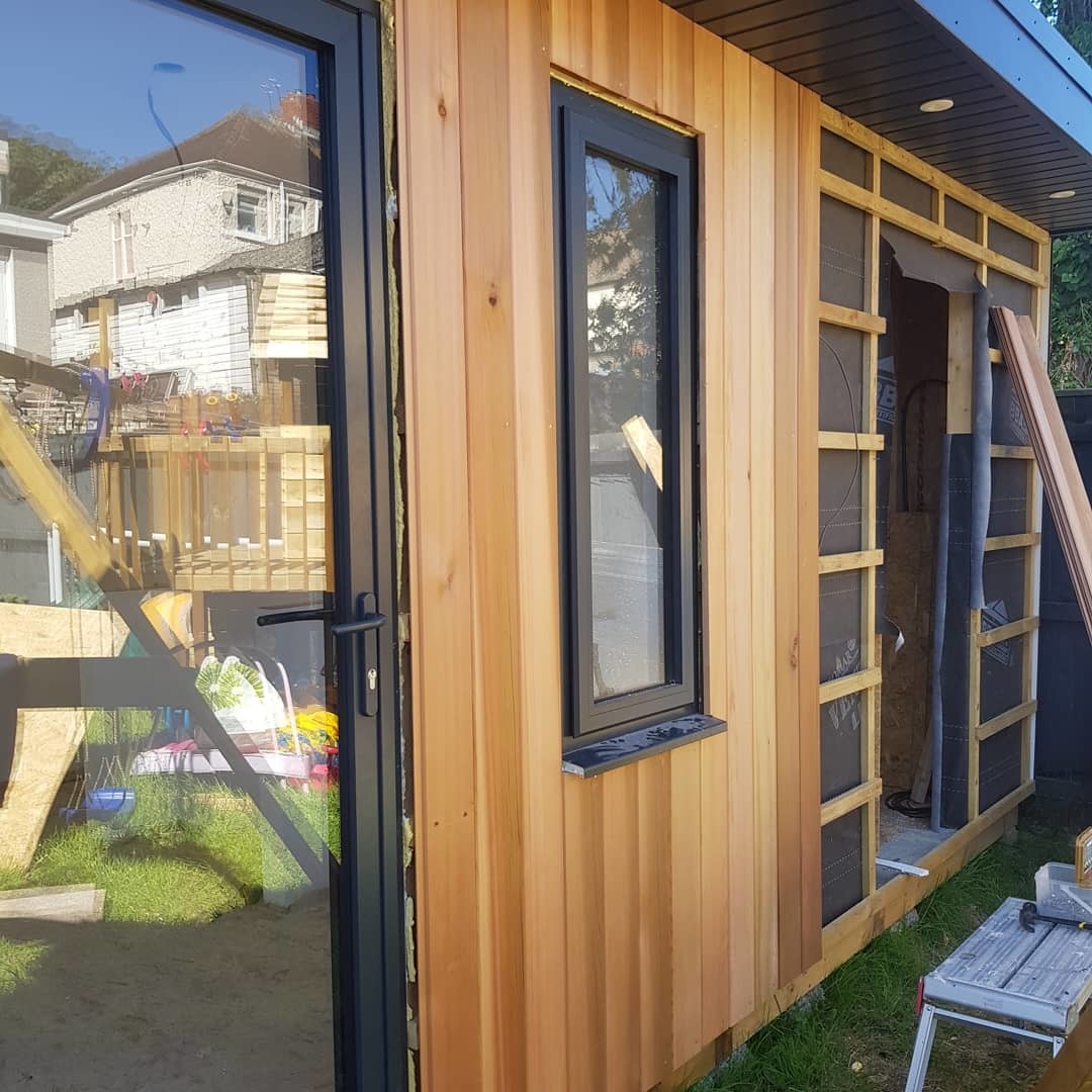 weston red cedar cladding with aluminium bifold doors