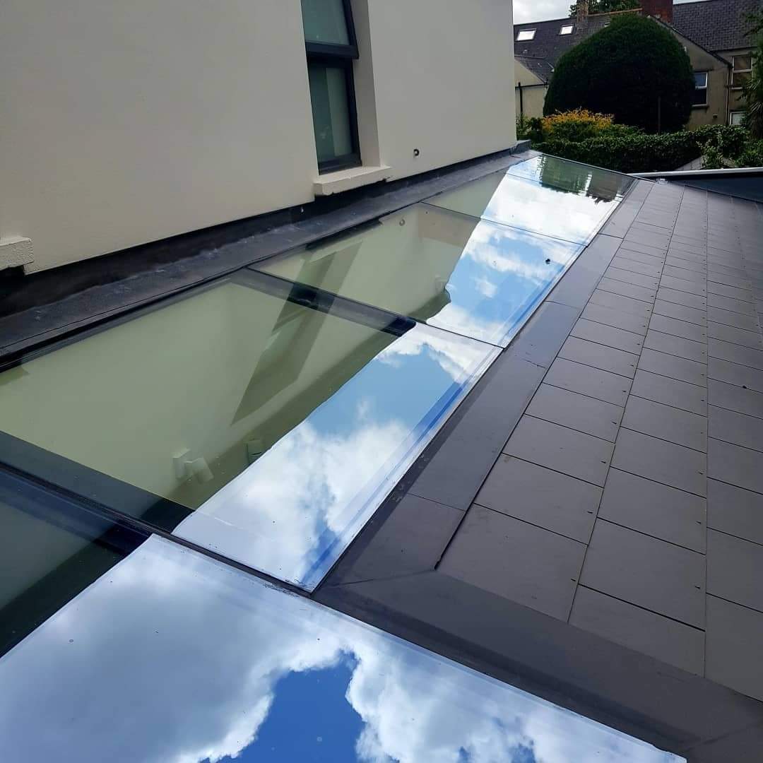 Bonded roof light against Welsh slate